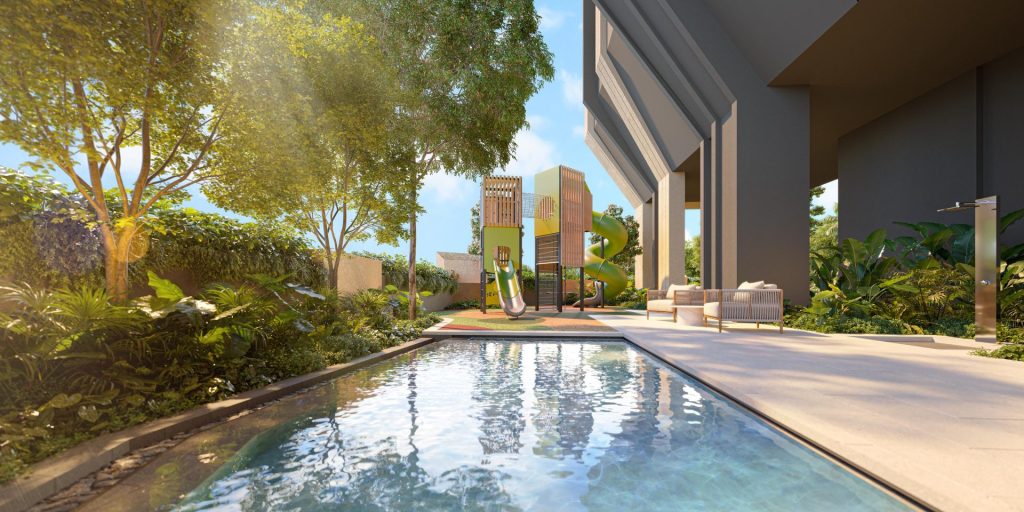Children's pool and playground with tube slide at The Serra Residences, a freehold condo